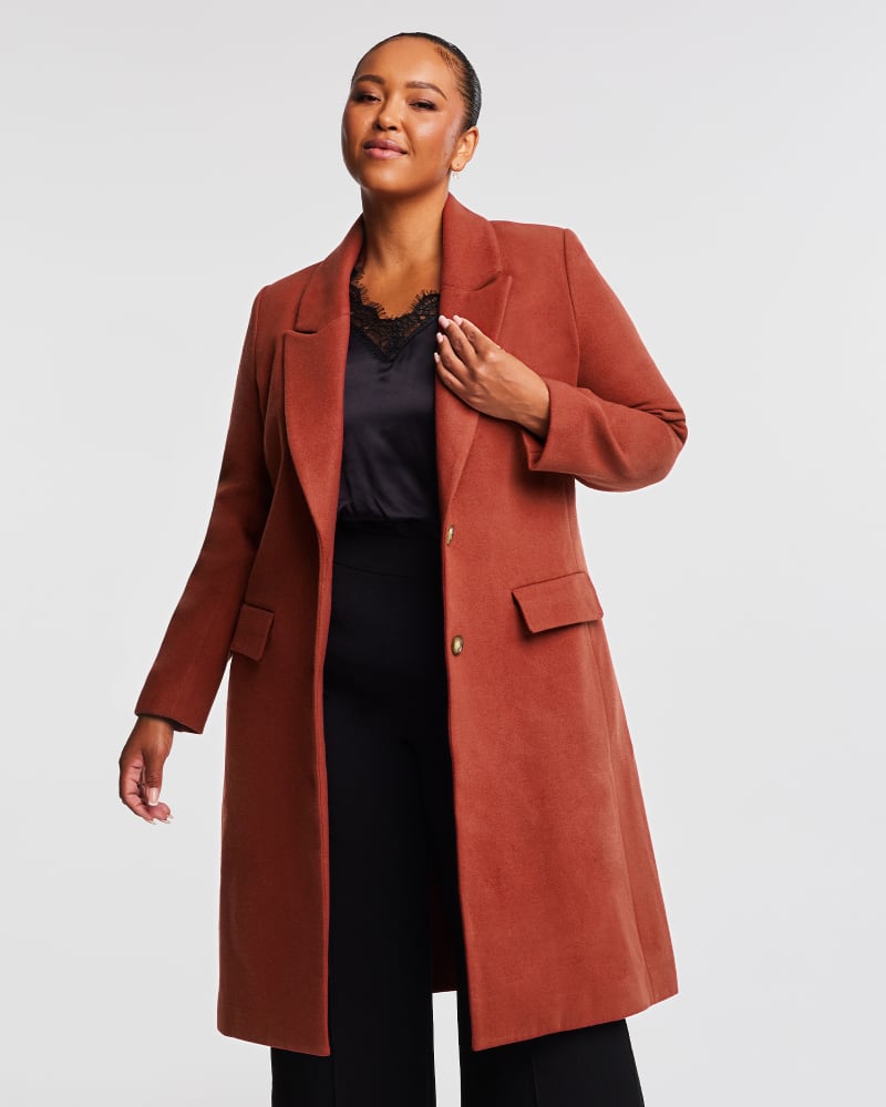 Front of a model wearing a size 20W Mia Coat in Rust by Estelle. | dia_product_style_image_id:315613